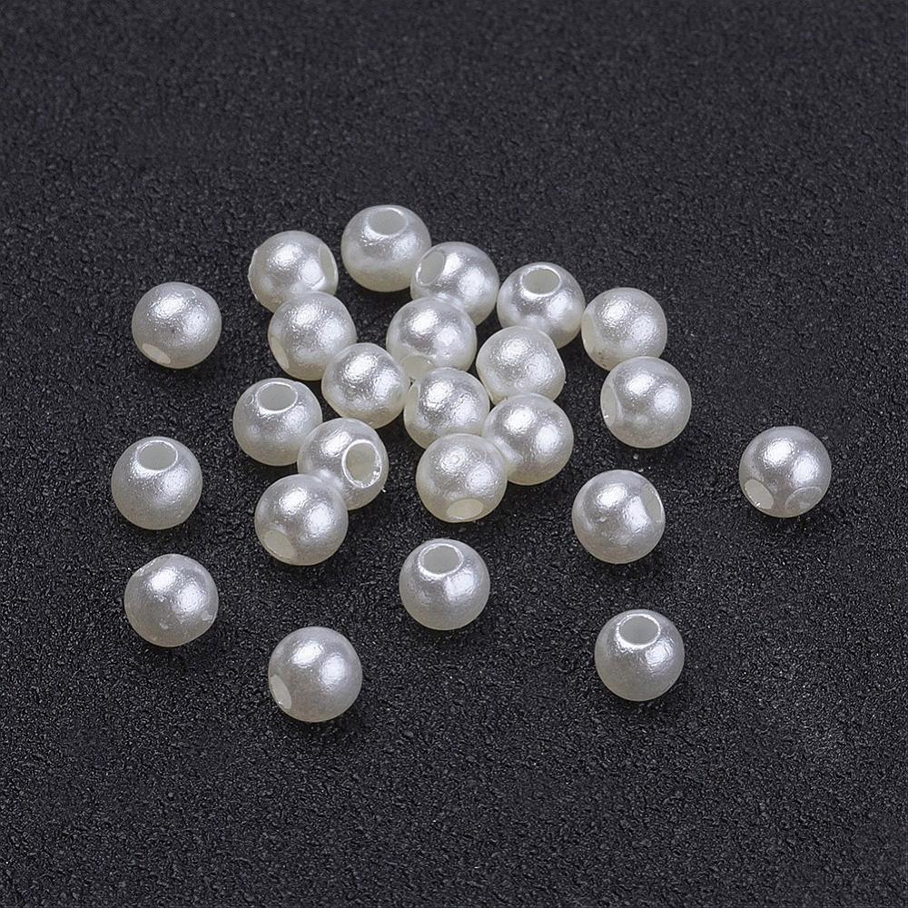 Perle imitation nacre, ronde, blanc cassé, diam 4mm, trou 1mm, l'unité