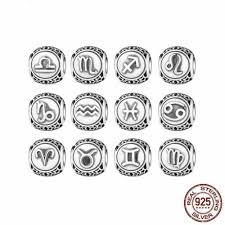 [1580] Cache noeud INOX argenté, motifs zodiaque; diam 9mm trou 4mm (balance)