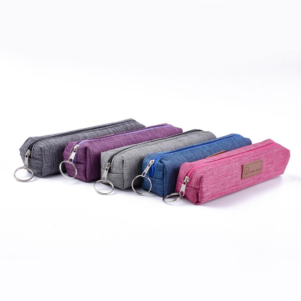 Trousse zippée, 20x15cm, coloris assortis