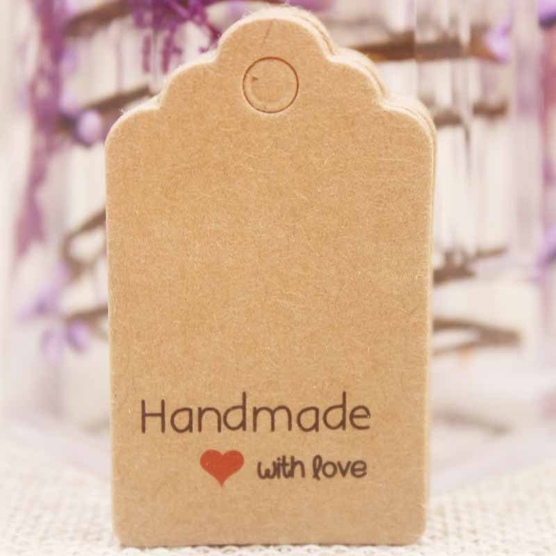 Etiquettes en carton &quot;handmade with love&quot;, kraft, rectangle 50x30x0,4mm, trou 5mm x 10 pcs