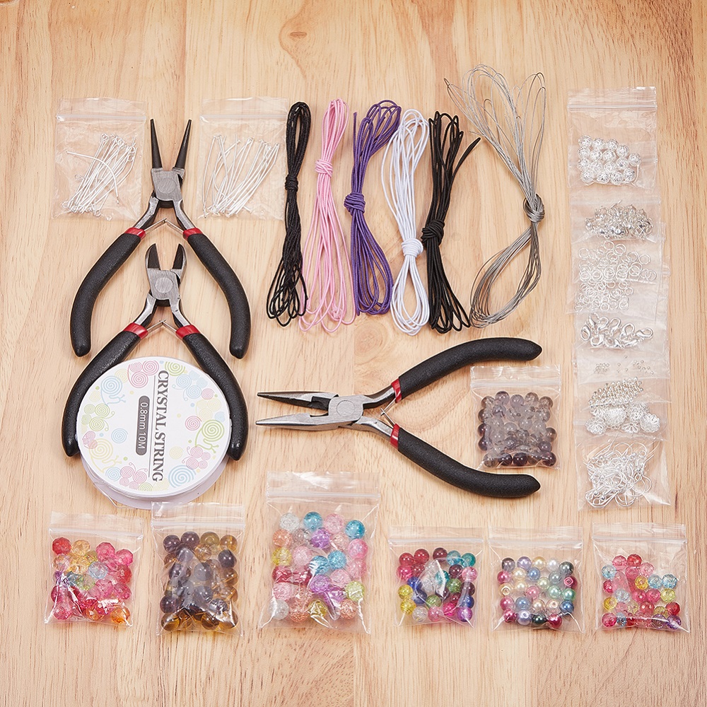 Kit complet pour la création de bijoux, incluant 3 pinces, les fils et de nombreux éléments