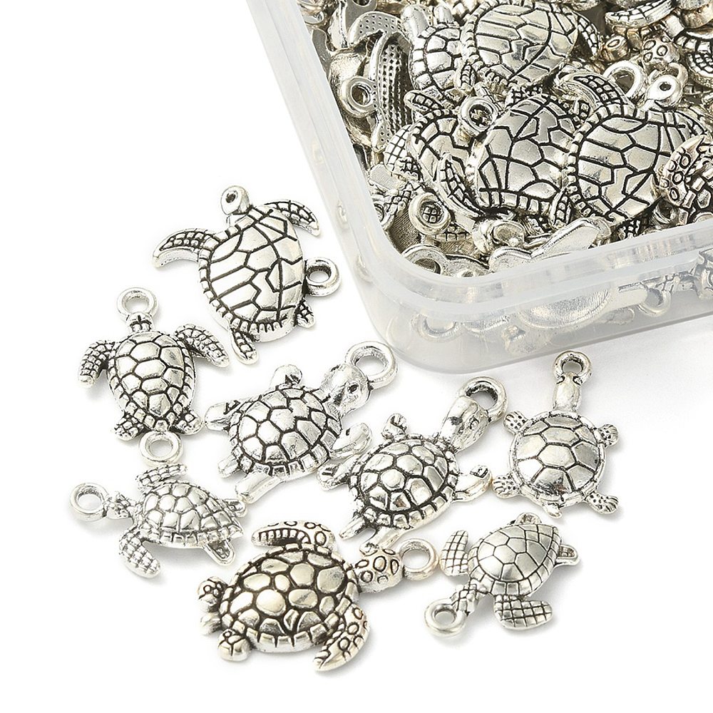 Pendentif tortue, laiton, couleur argent, env. 16x15x5mm, trou ~2mm, (différents modèles), unité
