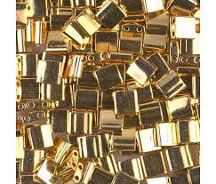 Perles Miyuki Tila 5mm, 24k gold plated, tube 7.2gr