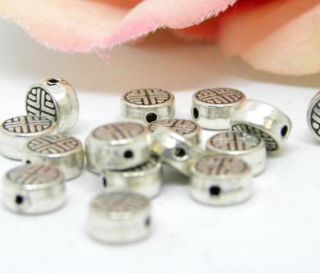 Perle tibetain metal argent antique ronde 6.3x3.5mm trou 1mm