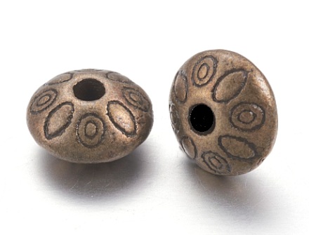 Perle en laiton couleur bronze, toupie avec dessin, 9x9x6mm, trou 1,5mm, l'unité
